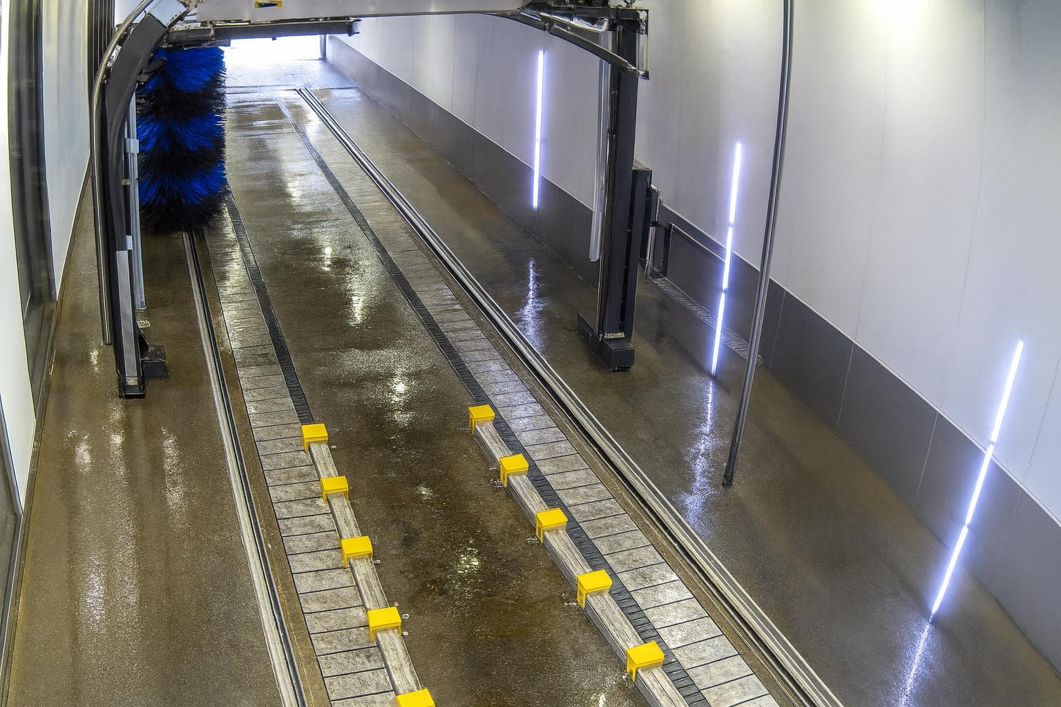 The tunnel empty and wet after the car has cleared the exit
